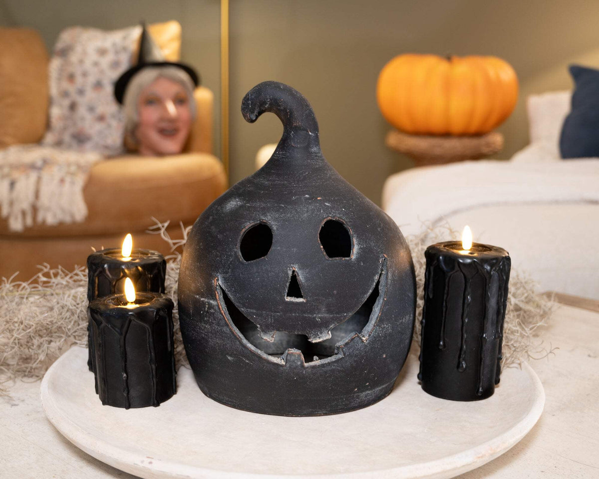 SET OF TWO BLACK CLAY JACK-O-LANTERNS