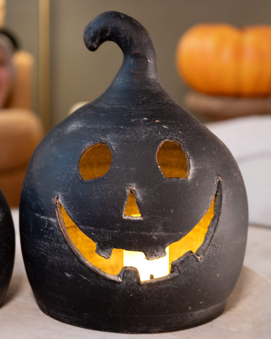 SET OF TWO BLACK CLAY JACK-O-LANTERNS